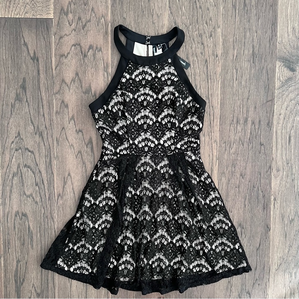 New back and beige lace dress